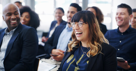 Business, seminar and woman with laughing in audience for financial training, ice breaker and funny presentation. Conference room, people or happy for employee engagement, feedback joke or work event