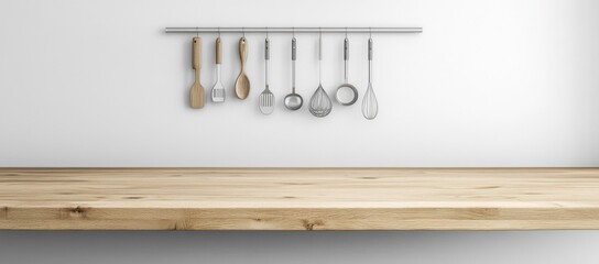 A wooden counter top with a bunch of kitchen utensils hanging from it