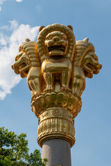 Golden Lion Capital majestically stands strong against the brilliant backdrop of the blue sky