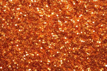 Vibrant orange glitter texture background. Ideal for adding sparkle to designs, greeting cards, or festive projects.