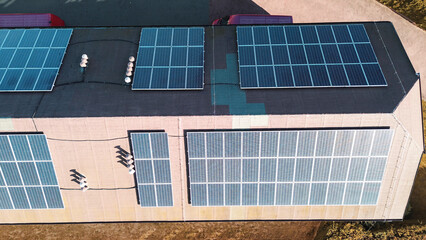 Aerial view of solar panels on industrial roof
