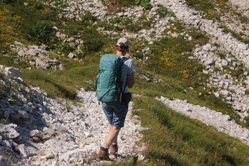 Mountaineer hiking on early morning, Triglav National Park, Slovenia