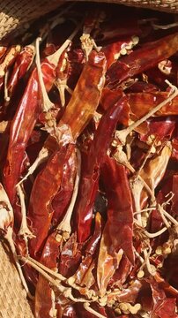 Dried red pepper in a canvas bag at a local market. Top view of dried red chilies or Lal Mirch. Hot Indian Spice 