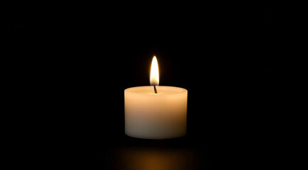Single Candle in Dark Room
