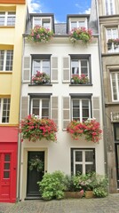 Fototapeta premium A charming building features numerous large windows adorned with vibrant flower boxes overflowing with colorful blooms, creating a lively and inviting atmosphere on its exterior.