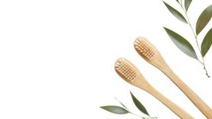 Sustainable bamboo toothbrushes with green leaves on a clean white background for eco-friendly oral care