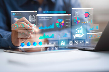 An analyst uses a computer and Ai technology dashboard for data business analysis and Data Management System, Customers database, gather information to report. Data science and digital marketing