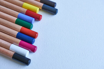  Coloured pencils on a white background. Pastel pencils.