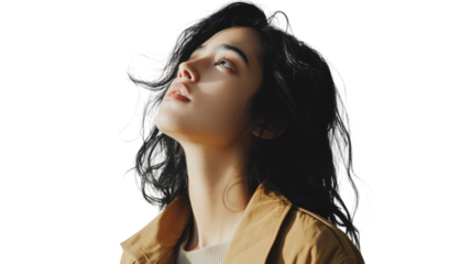 Woman gazing upward with flowing hair, showcasing contemplation and tranquility in a minimalist setting