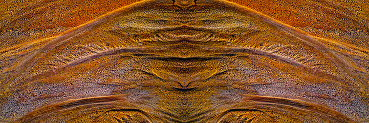 Natural patterns in the sand created by water at kaolin mine