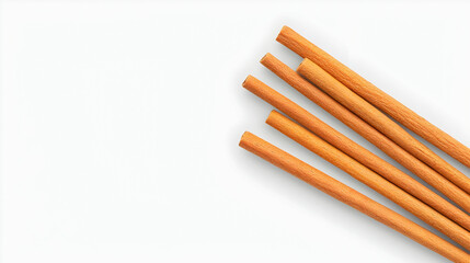 Obraz premium Natural Wooden Chopsticks on Plain Background for Culinary Use