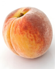 Fototapeta premium A soft, fuzzy peach on a white background. 