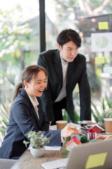 Sustainable Initiatives and Teamwork. Professionals brainstorming eco-friendly solutions in a collaborative environment.