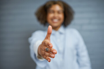Close-Up of Hand Reaching Out for a Friendly Greeting and Connection