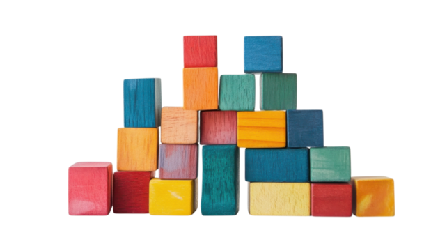 Colorful wooden blocks arranged in a pyramid shape on a white background creating a playful and educational display