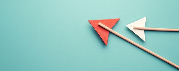 Import Tariffs economy strategy concept. Two colorful paper planes on a teal background.