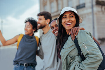 Group of happy tourists visiting a european city