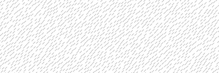 Slant dash handdrawn seamless pattern. Abstract simple bw bg with thin short diagonal strokes. Rain vector illustration.