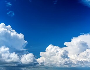 the sky is bright blue with thick white clouds