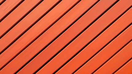 A close-up view of orange wooden planks arranged diagonally, showcasing texture and color variations.