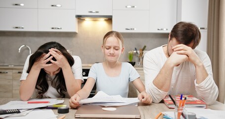 Family Faces Ongoing Struggles with Homework Challenges in Their Modern Kitchen Setup