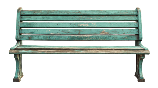 Rustic teal bench situated in an outdoor park area surrounded by nature during daytime