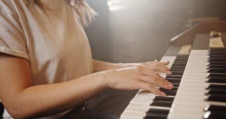 An Inspiring Piano Performance Set in Soft, Soothing Lighting that Captivates the Audience