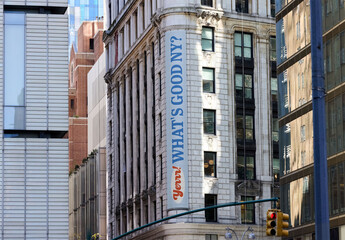 Mockup of Big fly banner on a corner facade in  New York