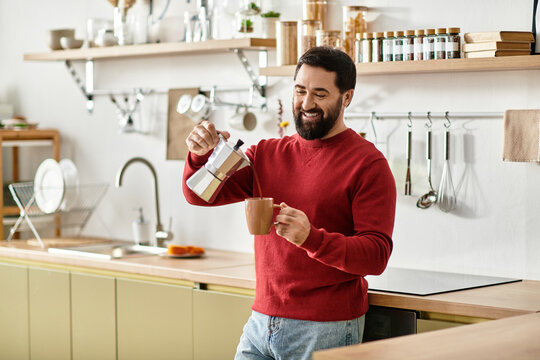 Elderly man enjoys a morning ritual of brewing coffee in a cozy kitchen setting filled with warmth