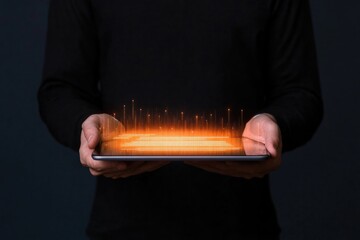 Hands hold tablet displaying glowing data visualization with vib