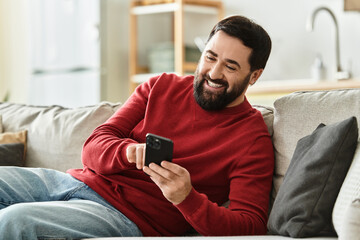 Engaging in timeless moments while relaxing at home with a smartphone