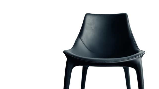 Black modern chair with sleek design positioned against a white backdrop showcasing minimalist furniture aesthetics