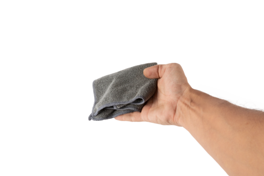 Male hand holding a cleaning cloth or dust rag isolated no background