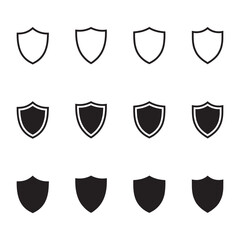 Collection of Shield Silhouettes and Outline Icons on Light Surface for Graphic Projects