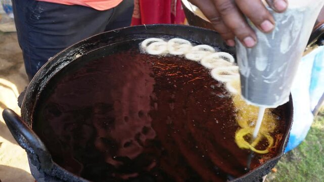 jalebi being made. jalebi is a popular Indian sweet