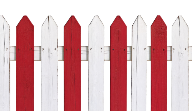 Colorful wooden fence with alternating red and white panels in bright sunlight