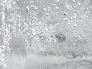 Ice texture  of frozen air bubbles floating up, close up