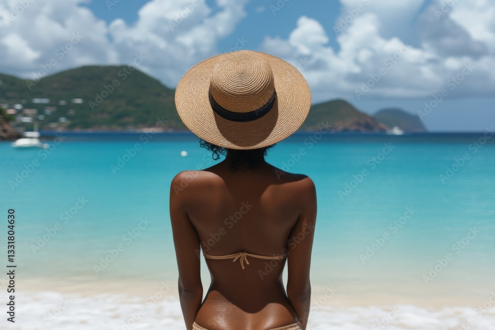 Poster relaxing at the beach with a view of turquoise waters and distant hills on a sunny day