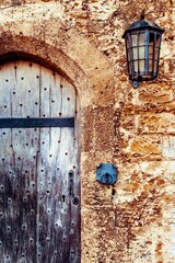 Rustic Wooden Door with Lantern