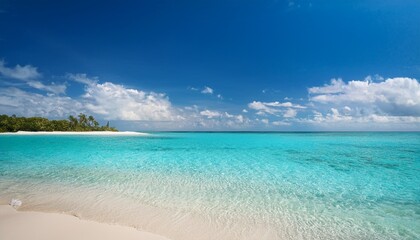 Obraz premium Calm beach scene with crystal clear water and soft white sands.
