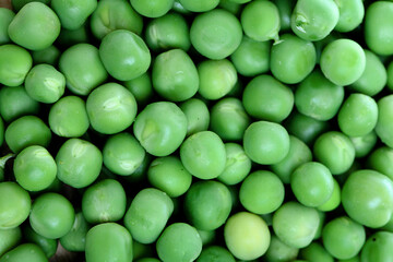 Organic fresh green peas background