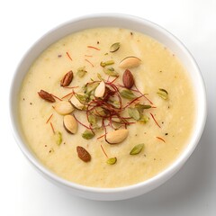 Creamy Saffron Phirni Garnished with Almonds and Pistachios in bowl 