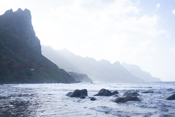 Dramatic Coastal Landscape of Tenerife, Spain – Ocean Waves and Rugged Mountains
