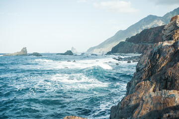 Dramatic Coastal Landscape of Tenerife, Spain – Ocean Waves and Rugged Mountains
