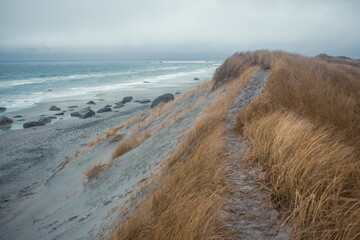 Scenic Coastal Dunes of Ogna and Brusand Beach, Norway – Windy Seashore with Golden Grass