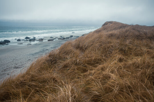 Scenic Coastal Dunes of Ogna and Brusand Beach, Norway &ndash; Windy Seashore with Golden Grass