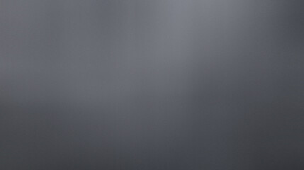 Dark misty background with soft gradients, texture. Abstract gray fog, blurred foggy atmosphere for design, wallpaper, or artistic projects.