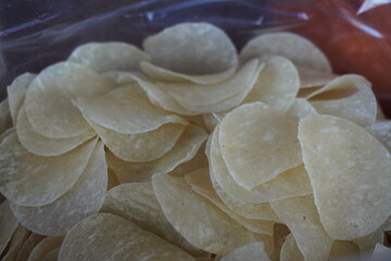 Uncooked prawn crackers, also known as prawn chips which are a popular snack and side dish in East and Southeast Asian cuisine