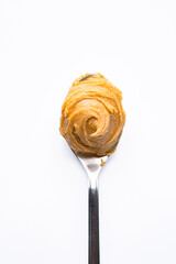Delicious and healthy peanut butter on white background