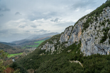 Rugged Mountain Vistas Under a Cloud-Dappled Sky